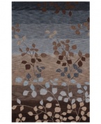 Inspired by the beauty of the natural landscape, the Studio rug from Dalyn adds undeniable drama to your living space. With a floral pattern accenting gorgeous layered hues of mocha, sky and midnight blue, the rug is hand tufted for incredibly plush texture.