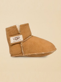 This lightweight, durable bootie in plush twin-faced sheepskin has a grip tape closure for easy access. Booties size: S (0-8 months), M (9-16 months), L (17-24 months). Imported This lightweight, durable bootie in plush twin-faced sheepskin has a grip tape closure for easy access. Booties size: S (0-8 months), M (9-16 months), L (17-24 months). Imported
