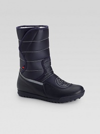 Unmistakeable GG stitching defines these waterproof nylon boots, accented with signature web detail.Grip-tape closureNylon upperFaux fur liningRubber solePadded insoleImported Unmistakeable GG stitching defines these waterproof nylon boots, accented with signature web detail.Grip-tape closureNylon upperFaux fur liningRubber solePadded insoleImported