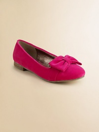 A slight stacked heel and girly bow update this soft, suede-like basic.Slip-onSynthetic upperSynthetic solePadded insolePolyurethane liningImported A slight stacked heel and girly bow update this soft, suede-like basic.Slip-onSynthetic upperSynthetic solePadded insolePolyurethane liningImported