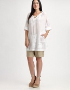 If you're looking for shorts with a relaxed fit, look no further than this linen style with classic front pleats and sporty, drawstring ties. Hook-and-eye closureDrawstring detailCord endsFront pleats and slash pocketsCuffed hemBack waist darts and welt pocketsInseam, about 8LinenMachine washImported