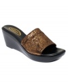 Simple, yet sparkly. Callisto's Shore wedge sandals slide on so easily.