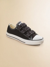 Signature Chuck style in a low-top version has three easy grip tape closures that make it simple to put them on and take them off. Rubber sole Traditional Chuck insole Cotton canvas Imported Please note: Toddler and infant sizes have two strapsFIT RECOMMENDATION: Because of generous cut, these sneakers run large. Please order 1 to 2 sizes smaller than regular shoe size. Signature Chuck style in a low-top version has three easy grip tape closures that make it simple to put them on and take them off. Rubber sole Traditional Chuck insole Cotton canvas Imported Please note: Toddler and infant sizes have two strapsFIT RECOMMENDATION: Because of generous cut, these sneakers run large. Please order 1 to 2 sizes smaller than regular shoe size.