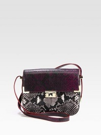 A chic python embossed leather style in a fun colorblock design with radiant hardware.Adjustable shoulder strap, 9½-13½ dropPush-lock flap closureThree inner compartmentsOne inside open pocketCotton lining8¾W X 7H X 2½DImported