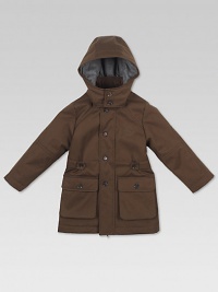 Crafted in plush cotton, this waterproof, flannel-lined, hooded parka has a full-zip front with buttoned covering, button-flap cargo pockets Crafted in plush cotton, this waterproof, flannel-lined, hooded parka has a full-zip front with buttoned covering, button-flap cargo pockets