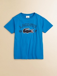A short-sleeved, pima cotton tee is adorned with an oversized croc apliqué and logo detail for authentic style.CrewneckShort sleevesPullover stylePima cottonMachine washImported A short-sleeved, pima cotton tee is adorned with an oversized croc apliqué and logo detail for authentic style.CrewneckShort sleevesPullover stylePima cottonMachine washImported
