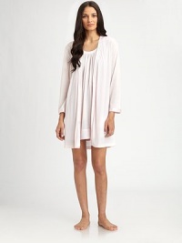 This ultra-comfortable layering piece is a simple yet elegant design, with a hint of sheen at the neckline, waist and cuffs. Long sleeves with dropped shouldersShiny trim at neckline and cuffsSelf-tie waistAbout 36 from shoulder to hem65% polyester/35% rayonMachine washImported This ultra-comfortable layering piece is a simple yet elegant design, with a hint of sheen at the neckline, waist and cuffs. Long sleeves with dropped shouldersShiny trim at neckline and cuffsSelf-tie waistAbout 36 from shoulder to hem65% polyester/35% rayonMachine washImported