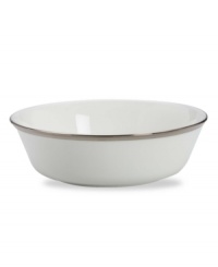 Beautiful in its simplicity, this dinnerware collection features a timeless, elegant design. The pristine white bone china is accented by a single, shimmering band of platinum. The understated beauty will add a refined sophistication to your dining experience for years to come. This all-purpose bowl is an essential serving piece for entertaining. Beautiful in its simplicity, this dinnerware collection features a timeless, elegant design. The pristine white bone china is accented by a single, shimmering band of platinum. The understated beauty will add a refined sophistication to your dining experience for years to come. This all-purpose bowl is an essential serving piece for entertaining.