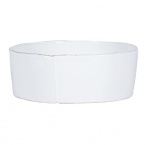 An effortless collection that transitions seamlessly from your kitchen to the table, these exceptional serving dishes solidify your presentation with down-to-earth elegance. Crafted in Tuscany from Italian stoneware, and featuring unique, rustic shapes with modern details, these pieces are built to last, both in terms of style and functionality.