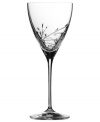 With a distinct contemporary shape and tender etchings, this wine glass brings refined grace to any table.