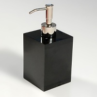 Contemporary bath accessories for the modern home in black and clear lucite. Contemporary bath accessories for the modern home in black and clear lucite.