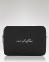 kate spade new york's latest laptop sleeve features a cheeky out of office message, sure to add a dose of whimsy to your unplugged adventures.