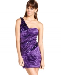 Adorned in paillettes and flaunting an asymmetrical panel design, this one-shoulder dress from Roberta dares you to rock out in statement-making party style. Adorned in paillettes and flaunting an asymmetrical panel design, this one-shoulder dress from Roberta dares you to rock out in statement-making party style.