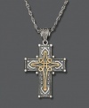 A 14k gold and sterling silver pendant that hearkens back to the Victorian age. Approximate length: 30 inches. Cross pendant drop is approximately 1-3/4 inches.