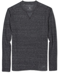 This cozy heathered long-sleeve t-shirt from Calvin Klein Jeans is perfect for layering looks. This cozy heathered long-sleeve t-shirt from Calvin Klein Jeans is perfect for layering looks.