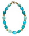 Bring some color into the colder months. This chic necklace from Lauren Ralph Lauren brings big style with reconstituted turquoise beads and openwork metal accents. Ring and toggle closure. Crafted in 14k gold-plated mixed metal. Approximate length: 18 inches.