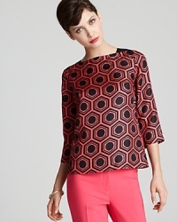 This deco-inspired Milly top features one of designer Michelle Smith's standout prints for a look that is unmistakably Milly. Add a statement necklace to really make the look pop. This deco-inspired Milly top features one of designer Michelle Smith's standout prints for a look that is unmistakably Milly. Add a statement necklace to really make the look pop.