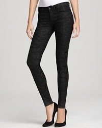 Time to shine in these Paige Denim skinny jeans, flaunting allover glitter for a glam finish. Time to shine in these Paige Denim skinny jeans, flaunting allover glitter for a glam finish.