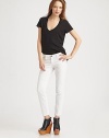 Classic rail-straight denim, finished with just a hint of stretch and a sophisticated crop.THE FITSlim fitRise, about 8Inseam, about 27THE DETAILSZip flyFive-pocket style98% cotton/2% elastaneMachine washMade in USA of imported fabricModel shown is 5'10 (178cm) wearing US size 4.