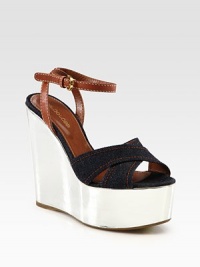 Divine denim and burnished leather straps rest upon a retro-inspired metallic leather wedge and platform. Metallic leather wedge, 5½ (140mm)Metallic leather platform, 1½ (40mm)Compares to a 4 heel (100mm)Denim and leather upperLeather liningRubber solePadded insoleMade in ItalyOUR FIT MODEL RECOMMENDS ordering one size up as this style runs small. Divine denim and burnished leather straps rest upon a retro-inspired metallic leather wedge and platform. Metallic leather wedge, 5½ (140mm)Metallic leather platform, 1½ (40mm)Compares to a 4 heel (100mm)Denim and leather upperLeather liningRubber solePadded insoleMade in ItalyOUR FIT MODEL RECOMMENDS ordering one size up as this style runs small.