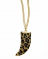 Safari chic. A bold horn shape and leopard print exude wild style on GUESS's pendant necklace. Crafted in gold tone mixed metal with brown and black epoxy and light Colorado topaz stones. Approximate length: 30 inches + 2-inch extender. Approximate drop: 2 inches.