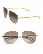 Following the brand's green initiatives, this sustainable design that is a part of the Gold Project created for the 2012 Olympic Games uses raw materials that stem from natural origins, yet retains its chic style with a lightweight metal frame and plastic temples. Available in gold with brown gradient lens. Metal logo temples100% UV protectionImported