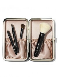 For flawless makeup application wherever you go, we kitted our travel brush set with 4 tools of the trade (in totable sizes). Inspired by Bobbi's Caviar & Oyster Collection, this limited edition set feels chic yet edgy in a sleek leather-like case. No need to wrap, this set comes in a Bobbi Brown gift box covered in a pretty pearl print. Set includes: Mini Face Blender Brush; Mini Eye Shadow/ Ultra Fine Eyeliner Brush; New Mini Smokey Eye Liner Brush; Mini Lip Brush with cap. Made in USA. 