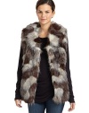 THE LOOKVariegated faux fur design Shawl collarFront fur hook closuresSleevelessSeam pocketsTHE FITAbout 26 from shoulder to hemTHE MATERIALPolyester/acrylicCARE & ORIGINDry cleanImportedModel shown is 5'10 (177cm) wearing US size Small. 