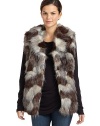 THE LOOKVariegated faux fur design Shawl collarFront fur hook closuresSleevelessSeam pocketsTHE FITAbout 26 from shoulder to hemTHE MATERIALPolyester/acrylicCARE & ORIGINDry cleanImportedModel shown is 5'10 (177cm) wearing US size Small. 