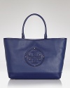 Clean lines and a strong shape makes Tory Burch's tote both classic and modern. Crafted from luxurious leather with a spacious design, it's a practically perfect for running errands.