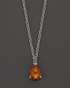 Detailed in 18K yellow gold, this Judith Ripka pear stone necklace frames a faceted honey corundum stone.