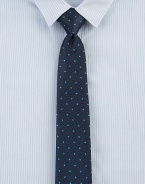 A micro-dotted classic piece, impeccably crafted of smooth Italian silk. SilkDry cleanMade in Italy