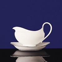 Subtle elegance rimmed in gleaming platinum; mix and match with colorful chargers for a dramatic statement. Bone China. Made in England. Subtle elegance rimmed in gleaming platinum; mix and match with colorful chargers for a dramatic statement. Bone China. Made in England.