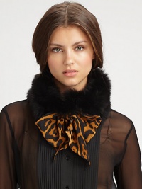Make a statement with this luxurious, tie front design trimmed in dyed fox fur. 30% virgin wool/30% cashmere/40% silkAbout 7 X 59Specialist dry cleanMade in Italy Fur origin: Finland Make a statement with this luxurious, tie front design trimmed in dyed fox fur. 30% virgin wool/30% cashmere/40% silkAbout 7 X 59Specialist dry cleanMade in Italy Fur origin: Finland