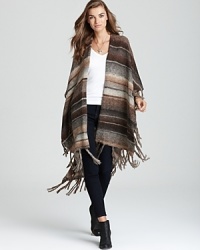 Cozy up to this made-for-fall Michael Stars wrap, crafted from an ultra-soft wool blend with a chic fringed hem, and inspired by the natural beauty of Santa Fe. Cozy up to this made-for-fall Michael Stars wrap, crafted from an ultra-soft wool blend with a chic fringed hem, and inspired by the natural beauty of Santa Fe.
