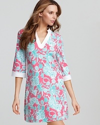 Transport yourself to Palm Beach in this pretty pink coverup from Lilly Pulitzer. The tunic silhouette and emblematic print are perennially chic.