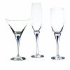 Orrefors Intermezzo Blue Collection designed by Erika Lagerbielke. From the name synonymous with unique and luxurious art glass, Orrefors' Intermezzo Blue has a distinct teardrop of blue in the stem.