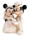 Commemorate any couple's magic day with this delightful Disney figurine featuring Mickey Mouse and Minnie Mouse. Accented with 24-karat gold and measures 5.5.