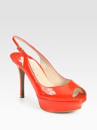 Contoured patent leather pairs with an adjustable slingback and peep toe for a modern take on this glamorous classic. Self-covered heel, 4 (100mm)Covered platform, 1 (25mm)Compares to a 3 heel (75mm)Patent leather upperLeather lining and solePadded insoleMade in ItalyOUR FIT MODEL RECOMMENDS ordering true size. Contoured patent leather pairs with an adjustable slingback and peep toe for a modern take on this glamorous classic. Self-covered heel, 4 (100mm)Covered platform, 1 (25mm)Compares to a 3 heel (75mm)Patent leather upperLeather lining and solePadded insoleMade in ItalyOUR FIT MODEL RECOMMENDS ordering true size.