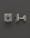 Elegant, intricately textured sterling silver cufflinks, set with sapphires, from Buccellati.