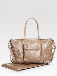 Designer styling ensures you'll still be carrying this elegant bag long after baby has grown, crafted of light, soft leather with two outer snap flap pockets, 2 open bottle pockets on each side, water-resistant lining with 1 zip and 3 open pockets, plus a matching changing pad.Two top handles, 8¾' drop Detachable shoulder strap Top zip closure 11½H X 17½W X 5½D Made in USA Designer styling ensures you'll still be carrying this elegant bag long after baby has grown, crafted of light, soft leather with two outer snap flap pockets, 2 open bottle pockets on each side, water-resistant lining with 1 zip and 3 open pockets, plus a matching changing pad.Two top handles, 8¾' drop Detachable shoulder strap Top zip closure 11½H X 17½W X 5½D Made in USA