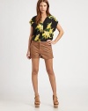 Vintage florals imbue this sophisticated silk button-down with hint of feminine chic.Point collarDropped shouldersShort sleevesButton-down placketHem longer in backAbout 23 from shoulder to hemSilkDry cleanImportedModel shown is 5'8½ (174cm) wearing US size Small.