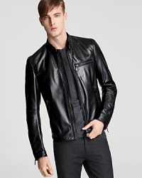 A sleek, trim, sophisticated jacket with a bit of edge for downtown appeal, rendered in sumptuous leather for a dramatic look anywhere you go. A sleek, trim, sophisticated jacket with a bit of edge for downtown appeal, rendered in sumptuous leather for a dramatic look anywhere you go.