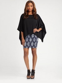 Abstract tribal print and elastic waistband make this ultra-fitted staple a trend-forward must. Elastic waistbandAbout 17 long86% rayon/13% nylon/1% spandexDry cleanImportedModel shown is 5'11 (180cm) wearing US size Small. Abstract tribal print and elastic waistband make this ultra-fitted staple a trend-forward must. Elastic waistbandAbout 17 long86% rayon/13% nylon/1% spandexDry cleanImportedModel shown is 5'11 (180cm) wearing US size Small.