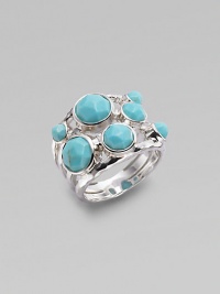 A wide ring, finished in the sophistication of turquoise, and exquisitely placed on a maze of sterling silver. Turquoise Sterling silver Width, about ¾ Imported A wide ring, finished in the sophistication of turquoise, and exquisitely placed on a maze of sterling silver. Turquoise Sterling silver Width, about ¾ Imported