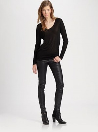 Back cutouts add a contemporary spin to this whisper-weight jersey must-have. ScoopneckLong sleevesBack cutoutsRayonDry cleanMade in USAModel shown is 5'9½ (176cm) wearing US size Small. Back cutouts add a contemporary spin to this whisper-weight jersey must-have. ScoopneckLong sleevesBack cutoutsRayonDry cleanMade in USAModel shown is 5'9½ (176cm) wearing US size Small.