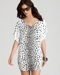 Carmen Marc Valvo's animal print tunic is destined to be spotted. Ideal post-plunge, this breezy kimono-inspired cover up hints at your wild side. Carmen Marc Valvo's animal print tunic is destined to be spotted. Ideal post-plunge, this breezy kimono-inspired cover up hints at your wild side.
