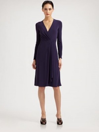 Fluid, richly-hued jersey, tailored with a flattering draped neckline and a knotted draped front.Surplice necklineLong sleevesGathered front drapeFlared skirtConcealed back zipFully linedAbout 26 from natural waist95% polyamide/5% elastaneDry cleanMade in Italy of imported fabricModel shown is 5'10½ (177cm) wearing US size 4. Fluid, richly-hued jersey, tailored with a flattering draped neckline and a knotted draped front.Surplice necklineLong sleevesGathered front drapeFlared skirtConcealed back zipFully linedAbout 26 from natural waist95% polyamide/5% elastaneDry cleanMade in Italy of imported fabricModel shown is 5'10½ (177cm) wearing US size 4.