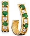 Graceful in design, these pretty hoop earrings feature round-cut emerald (1/3 ct. t.w.) and round-cut diamond accents set in 14k gold. Approximate diameter: 1/2 inch.