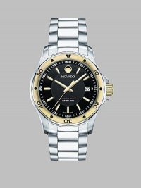 Two-tone stainless steel in a sleek, understated design for a classic time piece.Swiss quartz movement Water resistant to 20 ATM Goldplated stainless steel bezel with minute markers Round stainless steel case, 40mm, (1.57) Sapphire crystal Black dial Index hour markers Date display at 3 o'clock Second hand Stainless steel link bracelet Deployment buckle Made in Switzerland Two-tone stainless steel in a sleek, understated design for a classic time piece.Swiss quartz movement Water resistant to 20 ATM Goldplated stainless steel bezel with minute markers Round stainless steel case, 40mm, (1.57) Sapphire crystal Black dial Index hour markers Date display at 3 o'clock Second hand Stainless steel link bracelet Deployment buckle Made in Switzerland